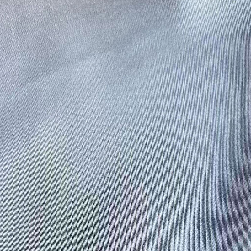 Cum îmbunătățește țesătura din satin elastic designul modern al îmbrăcămintei?