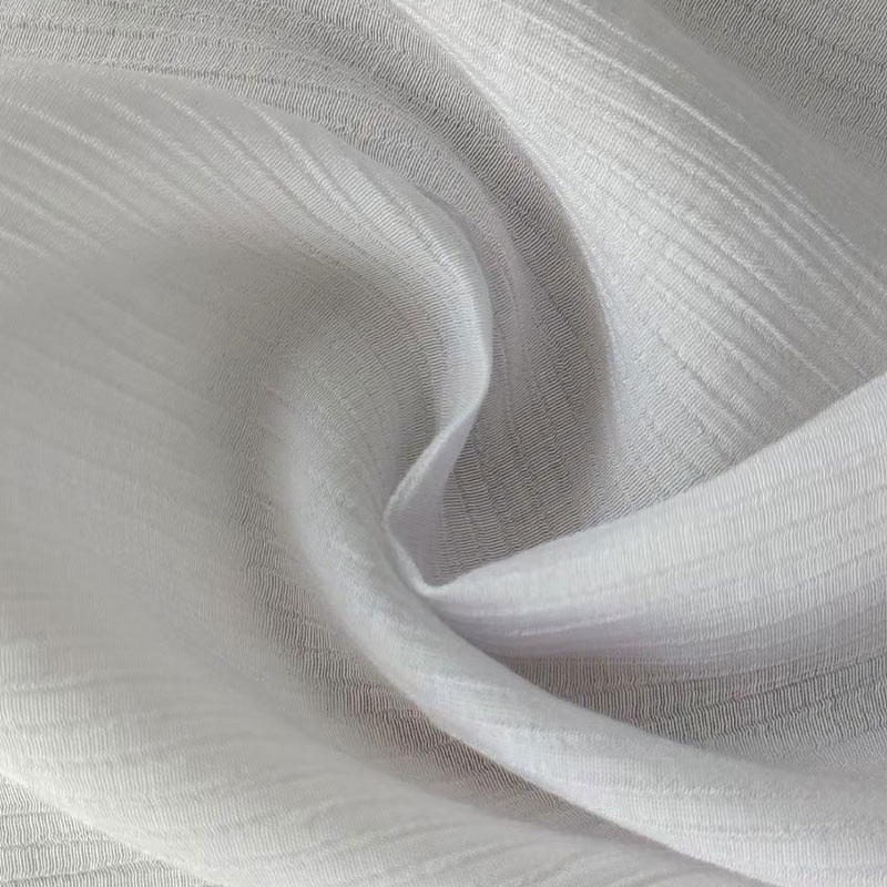 Țesătură puternic răsucită 4:1 cu un singur filament din raion/nailon cu textura încrețită